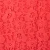 Tissu dentelle polyester stretch corail fleuri