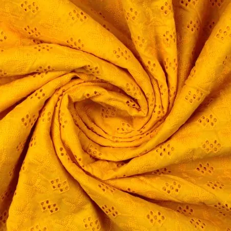 Tissu broderie anglaise jaune imprimé géométrique