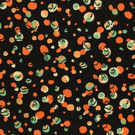 Tissu noir en viscose imprimé bulles orange, blanc et bleu